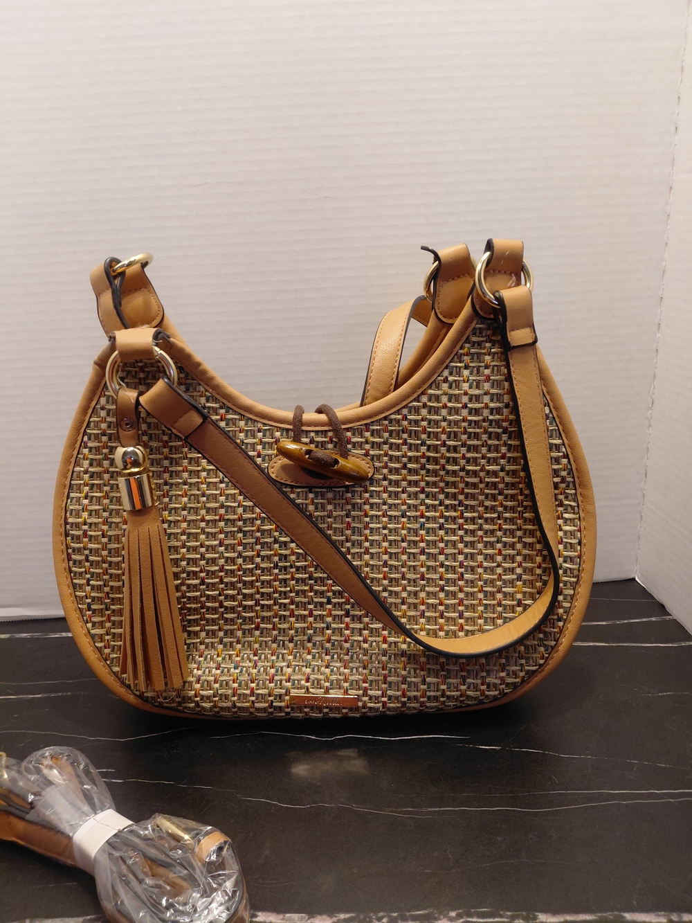 Simply Noelle Tan Woven Hobo Bag with Tassel Accent